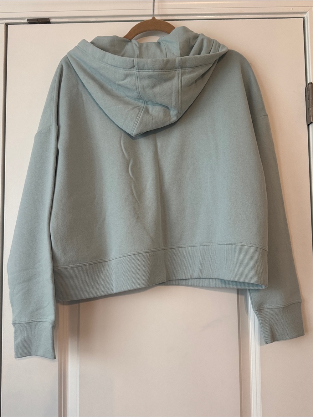 Calvin Klein Pale Green Cropped Pullover Hoodie with Metallic Logo - Picture 2 of 2